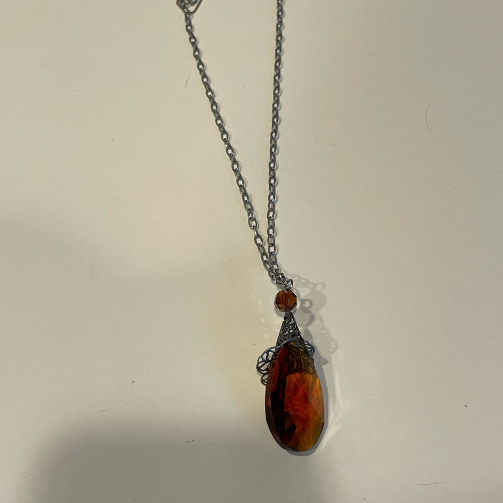 Elegant Silver and Amber Pendant Necklace